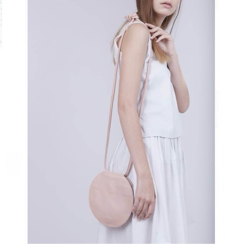Ladybird adjustable strap/convertible leather pink circle bag